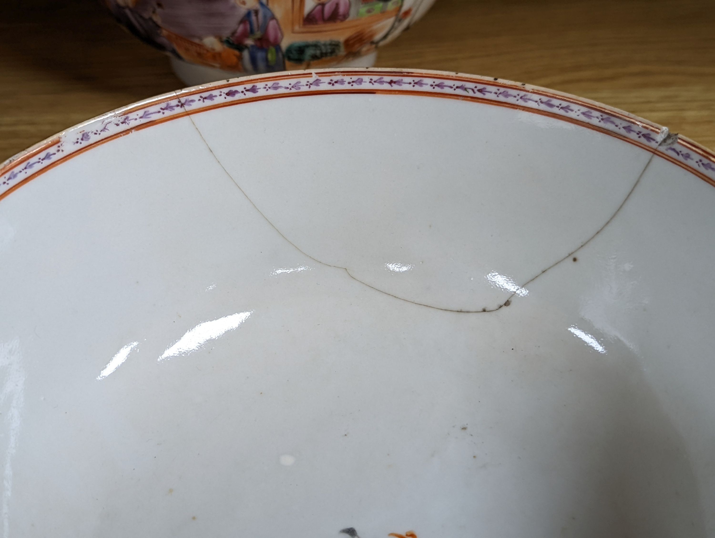 Two 18th century Chinese export bowls, a similar tea bowl and another Chinese blue and white tea bowl, largest 20cm diameter